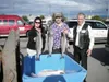 From left, Page Herring of Northern District Setnetters, Palmer
Senior Center chef Jeff Dinks and Richard G. Tubbs, the center’s
executive director, look over donated salmon donated to Palmer