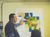 Houston councilman Jim Johansen gestures in front of a map at Thursday’s council meeting. Members ultimately voted 5-2 against granting a heavy industrial zoning to a parcel of land owned by 