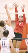 ROBERT DeBERRY/Frontiersman Wasilla sophomore Sariah Tuisaula
stretches to block a Homer Mariner spike earlier in the year.
Wasilla is a No. 3 seed.