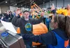 Crops Superintendent for the Alaska State Fair Kathy Liska moves in to give Dale Marshall a hug after she reads off the weight. J. David McChesney/Frontiersman
