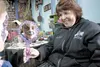 Face painter Marcela Murad holds a mirror for Caitlyn Michel, 7, at the Marky and Friends face painting booth at the Alaska State Fair Saturday afternoon. The popular booth, owned by Mark Wil