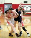 Wasilla's Layla Hays battles for possession against Palmer's Alyssa Clark during a win over the Moose. Bruce Eggleston/matsusports.net