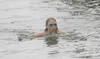 HEATHER A. RESZ/Frontiersman Haylie Hellman, 11, was the
youngest contestant in this year’s Big Lake Triathlon. She swam as
part of the HTB’s Team. Hellman was one of the only people to jump
