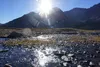 The evening sun shines near the summit of Crow Pass in the Chugach National Forest in the summer of 2021. Alaska’s far-north latitude puts the sun low in the sky in summer, causing solar heat