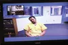 Tyler Snodgrass, 29, of Wasilla is arraigned via television link in front of Palmer District Court magistrate Craig Condie Friday afternoon. Police say they caught Wasilla residents Snodgrass