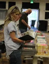 Members of the Library Citizens' Advisory Committee (LCAC) peruse some of the challenged books as they decided which would be the first for review. "The Lovely Bones," "It's Perfectly Normal,