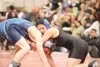Colony’s Racheal Shannon takes on Cordova’s Darin Gilman in a
135-pound match during the Houston Invitational at Houston High
School last week. ROBERT DeBERRY/Frontiersman