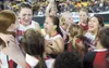 The Wasilla Warriors varsity girls basketball team celebrates
after defeating the Juneau-Douglas Crimson Bears to claim the 4A
state basketball championship title. ROBERT DeBERRY/Frontiersman