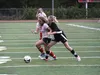 Wasilla sophomore Daija Doughty fights past Nikiski's Molly Cason during a 3-0 win over the Bulldogs. The Warriors moved into the Northern Lights Conference Championships semifinals with the 