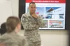 Chief Master Sgt. Luis Reyes, Army and Air Force Exchange Services senior enlisted advisor, listens to town hall meeting participants at the Exchange at Joint Base Elmendorf-Richardson, Alask