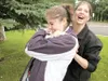 ROBERT DeBERRY/Frontiersman Palmer resident Holly Haney, 16,
left, falls backwards as Wasilla’s Briar Thurmond, 13, catches her
during a trust-building exercise Monday at the Alaska Points of