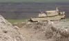 A remote-controlled concept assault breacher vehicle prepares to breach an obstacle during field testing at the Joint Warfighting Assessment 19, April 28, 2019. Spc. Daneille Hendrix