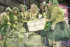 Scott Robb of Wasilla poses with his world-record 138.25-cabbage and the Cabbage Fairies at the 2012 Giant Cabbage Weigh-Off at the Alaska State Fair Friday. HEATHER A. RESZ/Frontiersman