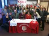 Wasilla High School senior Leya DePriest signed a National Letter of Intent to attend the University of Denver and play basketball for the Division I Pioneers during a ceremony at Wasilla Hig