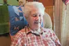 Margaret Lucas celebrates her 99th birthday with friends Thursday at her Palmer home. Lucas and her husband, Leo, were convinced to move to Alaska in 1939. ROBERT DeBERRY/Frontiersman.com