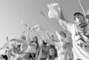 ROBERT DeBERRY/Frontiersman Colony High School super fans cheer
on the Knights as they take the field Friday against the rival
Palmer Moose.