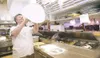 ROBERT DeBERRY/Frontiersman Pizza Delphi owner Vasilios
Koragounis still throws dough in the kitchen at his pizzaria in
Palmer. Koragounis is celebrating his 30th year in business.
