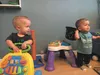 Jaxon Finch (left) and Jace Weber smile for the camera during an in-home interview at Jessica Weber’s house on Sunday. The toddlers, who will turn two years old in late December, were born wi