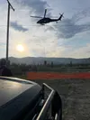 A Blackhawk Helicopter supporting Nelchina Glacier Fire. Blackhawks can deliver 700 gallons of water directly to the most active parts of the fire, helping slow its forward progress and prote