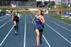 Palmer High's Ruby Woodings sprints to the finish line in the girls' 400 meters during the preliminary round of the Palmer Invitational May 13, 2016, at Palmer High School. JEREMIAH BARTZ/Fro