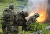 Combat engineers assigned to Sapper Company, 6th Brigade Engineer Battalion (Airborne), 4th Infantry Brigade Combat Team (Airborne), 25th Infantry Division, U.S. Army Alaska, utilize a contro