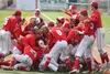 The Wasilla Warriors celebrate an 8-6 win over Ketcikan in the ASAA/First National Bank State Baseball Championships title game Saturday, June 1, 2019, at Mulcahy Stadium in Anchorage. Jeremi
