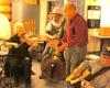 Schwabenhof owner Bill Weith joins in at the end of a bluegrass jam session at his bar earlier this month. Tim Rockey/Frontiersman