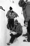 Bryan Quimby and Alys Culhane look in as Nancy Pfieffer records
the test pit data in her log book. This, for Pfieffer, is an
ongoing process. Photo submitted by ALYS CULHANE