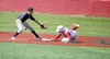 Kenai infielder Porter Fannon tries to tag Wasilla's Ben Werner at second during a 13-3 loss to the Road Warriors Wednesday at Wasilla High School. Jeremiah Bartz/Frontiersman