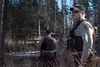 Mark Sledge, 673d Civil Engineering Squadron senior conservation law enforcement officer, and James Wendland, 673 CES chief conservation law enforcement officer, approach a black bear den at 