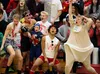Wasilla High School volleyball fans celebrate during a 3-2 win over Colony Friday at Wasilla High School. Jeremiah Bartz/Frontiersman