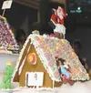This house has a Santa made of icing coming down the chimney.
Photo by CASEY RESSLER.