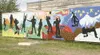 This 40-foot mural designed and painted by area students is a
new addition to the Palmer Arts Council’s property on East Dahlia
Avenue in Palmer.