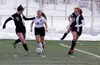 Junior Ashlynn Cornelisen plays the ball through traffic during a 1-1 tie against Chugiak Thursday at Colony High School. JEREMIAH BARTZ/ Frontiersman