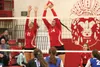 Wasilla's Merit Paramo and Leya DePriest reach for the block during a 3-2 win over rival Palmer Oct. 27 at Wasilla High School. JEREMIAH BARTZ/Frontiersman