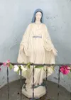 The Virgin Mary has been returned to the grotto behind St.
Michael's Church in Palmer. The statue was stolen sometime Tuesday.
(ROBERT DeBERRY/Frontiersman)