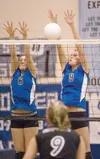 Palmer's Rebecca Stella, left, and Sarah Scoresby block a
Skyview Panther shot during Friday's game at Palmer High School.
(ROBERT DeBERRY/Frontiersman)