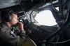 U.S. Air Force Staff Sgt. Andrew Liddane, 909th Air Refueling Squadron boom operator, prepares for in-flight refueling during RED FLAG-Alaska 19-3 at Eielson Air Force Base, Alaska, Aug. 7, 2