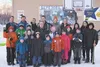 The students of Beryozova stand in front of their school in Willow with Principal Carl Chamblee (Mat-Su Borough School District Federal Programs Administrator), high school teacher Simon Nash