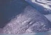 The largest splash wave ever recorded, in Southeast Alaska’s
Lituya Bay, sheared a slope of trees and topsoil to a height of
1,740 feet above sea level. Photo by Don Miller, U.S. Geological S