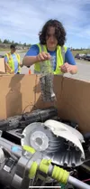 Jasmine Perea with Backhaul Alaska, helps receive and sort electronic items brought in during the Electronic Recycling event in Big Lake. The final opportunity to drop off electronics gatheri