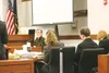 The defense listens to testimony by pediatric neurologist Roderic Smith Thursday. Smith treated 15-month-old Jocelynn Allison three times before she died on a Providence Alaska Medical Center