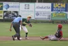 Pedro Camacho, of the Wasilla Road Warriors, tries to slide into second during an exhibition game with the Mat-Su Miners. Jeremiah Bartz/Frontiersman