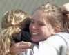 Palmer’s Erin LaMere is congratulated on winning the shot put
Friday during the first day of the state track and field meet.
(ERIC ENGMAN/Fairbanks Daily News-Miner) ERIC ENGMAN