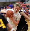 Wasilla senior Reilly Devine makes a move inside during a victory over Lathrop Saturday, Feb. 24, 2017, at Wasilla High School. Courtesy of Bruce Eggleston/matsusports.net