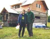 Norma and Joe Delia stand in front of their new cabin in Skwentna in this 1997 file photo. MARK D. KELSEY/Frontiersman file photo