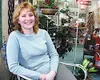Dianne Willett, surrounded by flowers in her shop Floral
Creations. WILLIAM WOODY/ Frontiersman