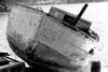 An old ship rests in the harbor in Juneau, showing its age with
cracks and wrinkles. A strong commerical fishing industry helps
fuel Juneau's economy, along with government, mining and touris
