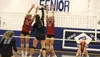 Wasilla's Jada Schultz and Josi Schachle go up for the block during a 3-0 win over Palmer Thursday night. Tim Rockey/Frontiersman