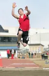 Wasilla’s Chris Bydlon spots his landing during the long jump
competition Thursday at the Palmer Chaos track meet. (ROBERT
DeBERRY/Frontiersman)